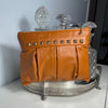 Mustertasche oranges Glattleder mit goldenen Nieten